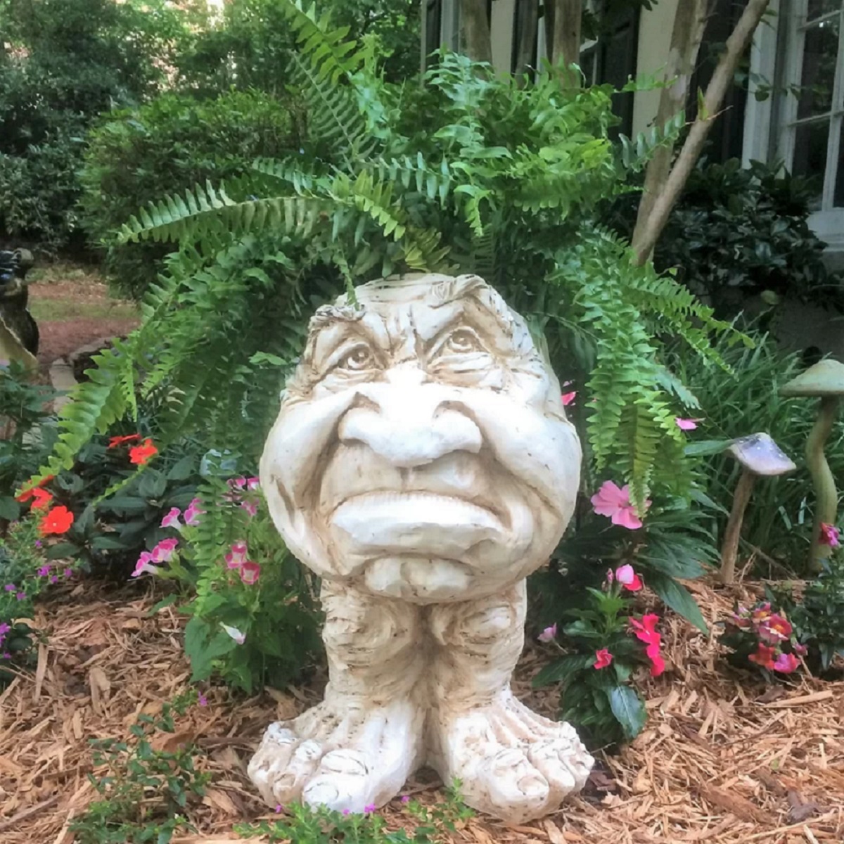 grumpy dwarf statue