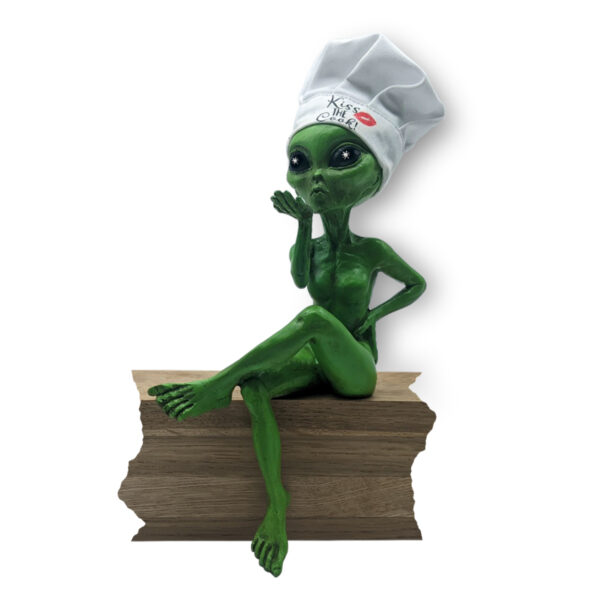 Alien Invasion™ - “Kiss the Cook” Female Alien Statue with Chef’s Hat 10 “ H Alien Figurine Shelf Sitter Funny Kitchen or  Home Decoration - Cosmic Green